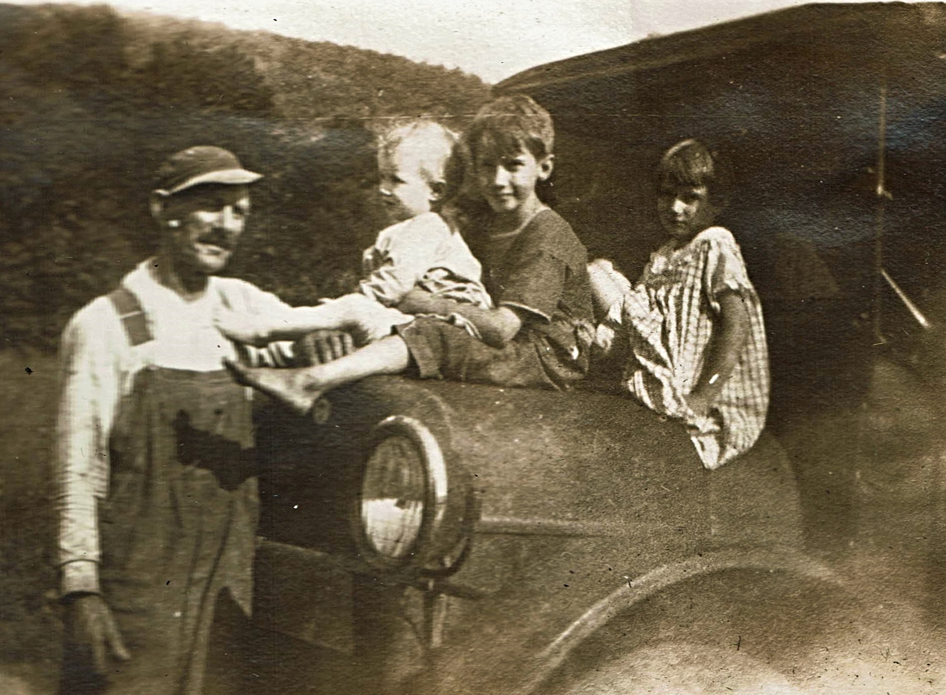 Photo of Henry, Tom and Anne Thompson, plus their great-, William Boller