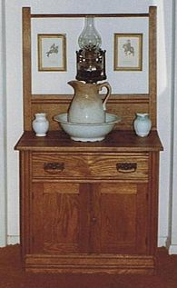 Photo of a combination washstand-commode (i.e. a cabinet to hold a chamber pot