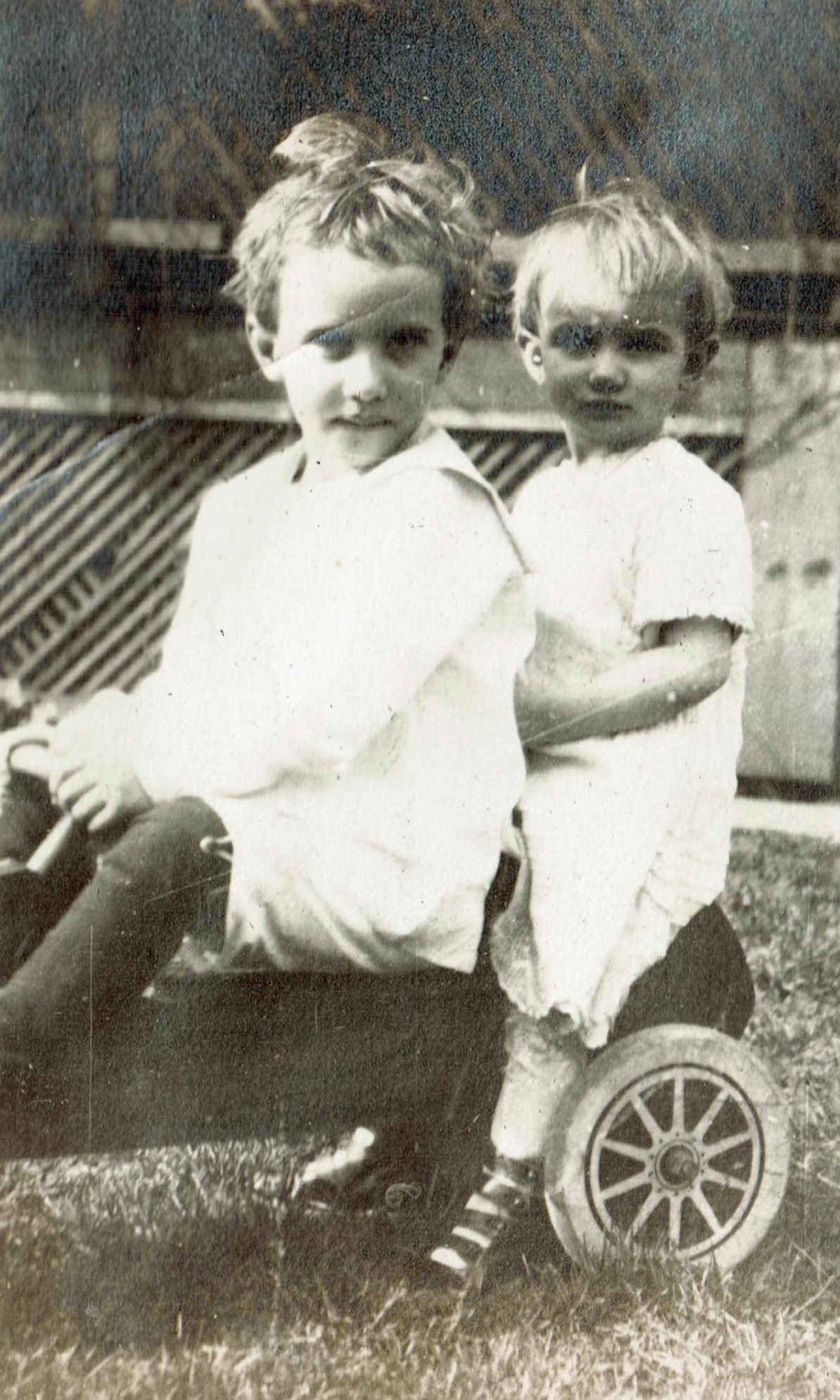 Photo of Tom and Anne in a cart, ca 1921